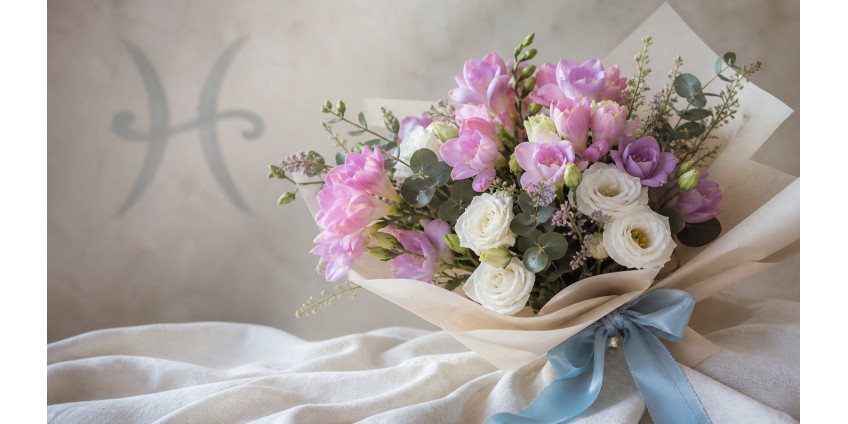 Pisces — the zodiac's flower: freesia, forget-me-not, and the pastel bouquet